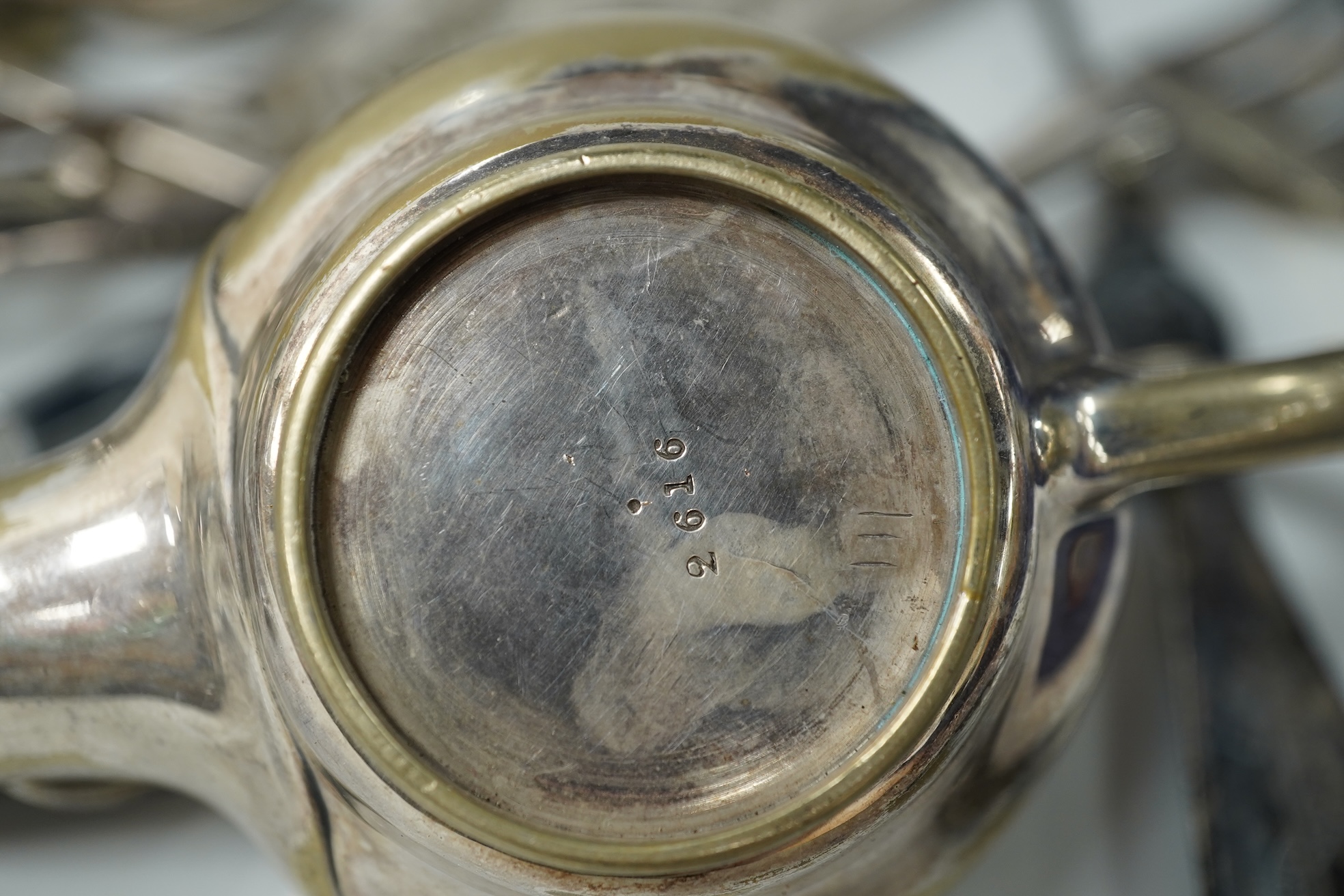 A collection of various plated wares and small silver